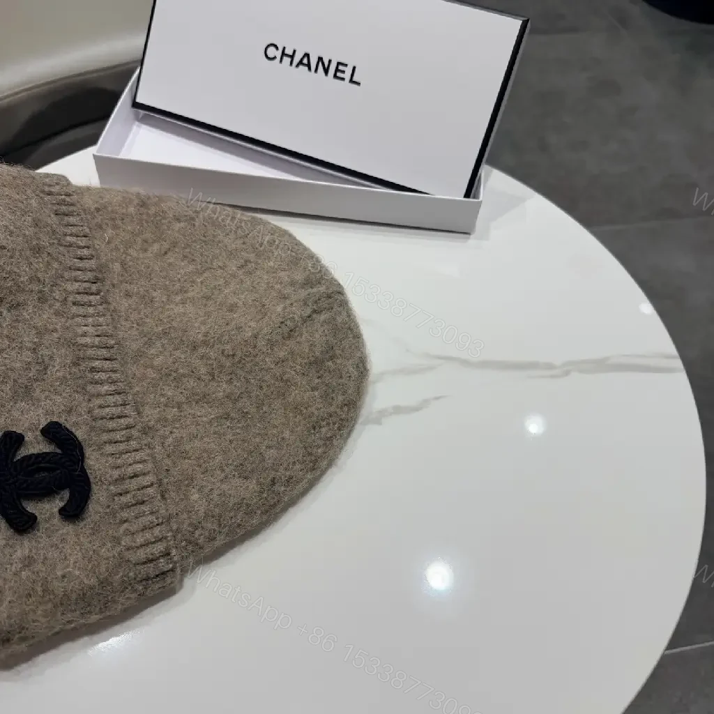 View 9 of Cozy Beanie in Taupe Knit | Luxe, Subtle Logo, Everyday Warmth