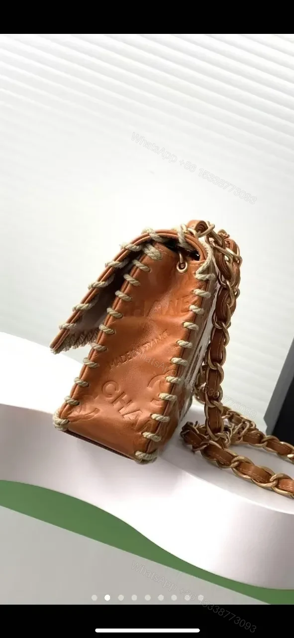 View 2 of Textured Leather Flap Bag with Gold Clasp, Whipstitch Accent, Crossbody Style