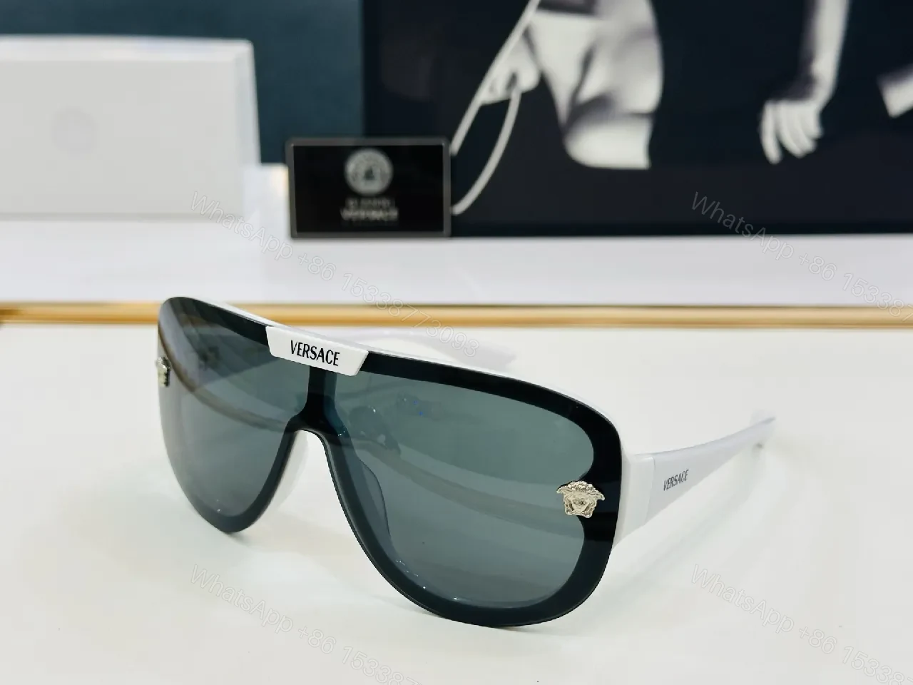 View 6 of Black Gloss Shield Sunglasses with Gold Emblems, Oversized Style