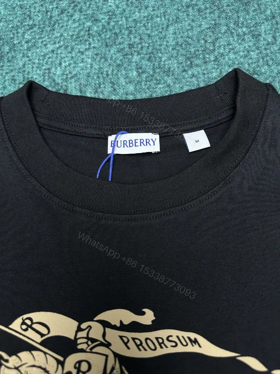View 9 of Minimalist Black Tee: Crest-Inspired, Elevated Comfort Tee