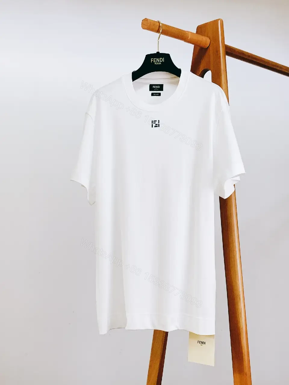 View 4 of Minimalist White Cotton Tee with Subtle Luxury Detail