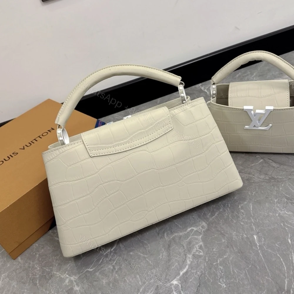 View 3 of Louis Vuitton Capucines MM East West In Grey 33Cm