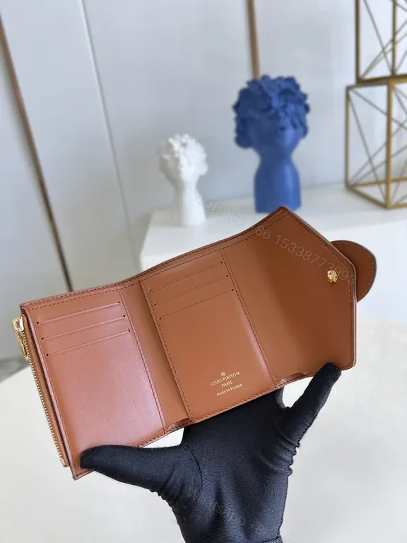 View 4 of Iconic Victorine Wallet: Compact Luxury Canvas & Leather Trim