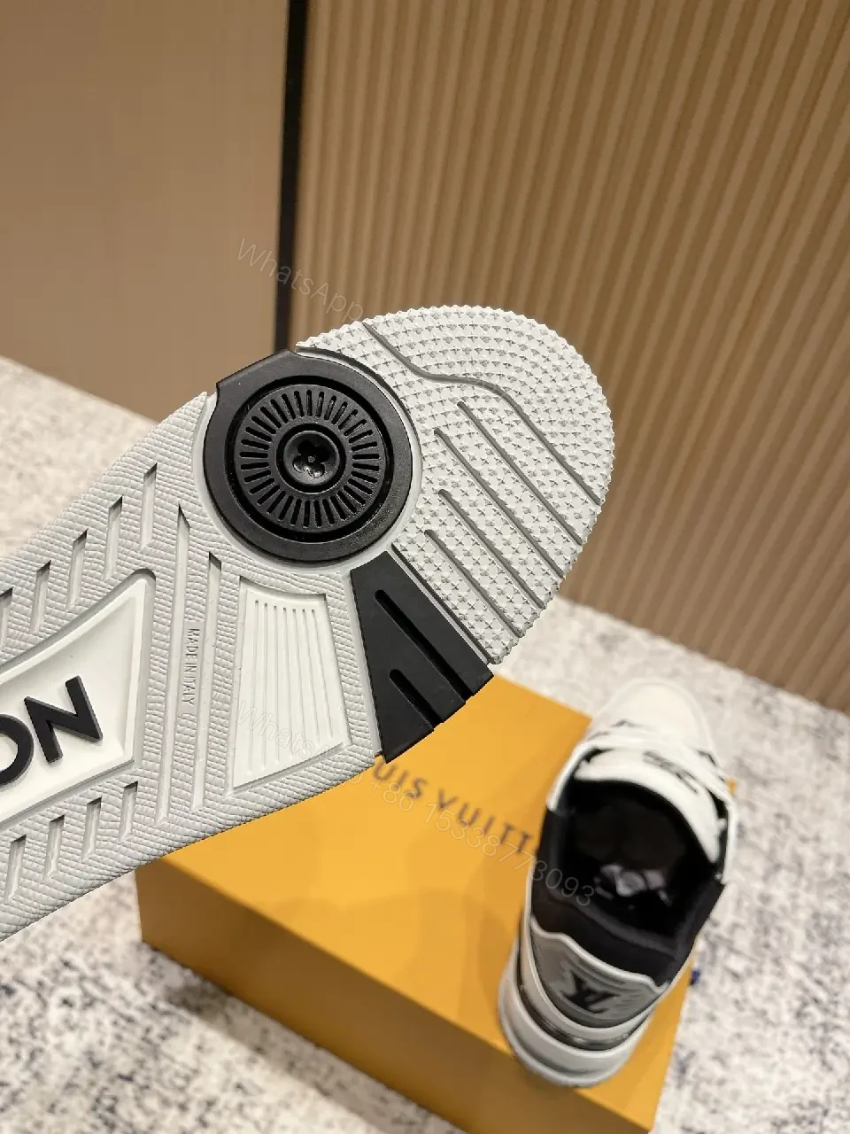 View 7 of White Leather Runner Sneakers with LV Detailing