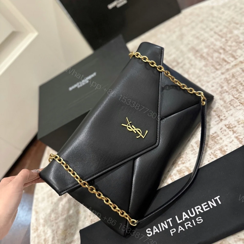 View 3 of Saint Laurent Cassandre XXL Pouch On Chain In Shiny Black 35Cm