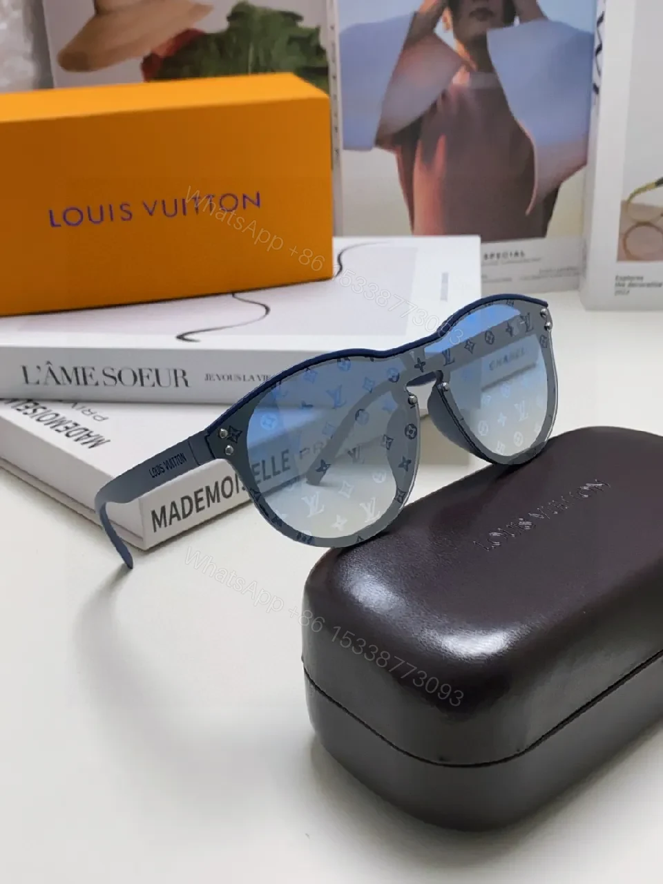 View 5 of Blue Translucent Monogram Shield Sunglasses - Oversized, UV-safe, Light-Weight Acetate