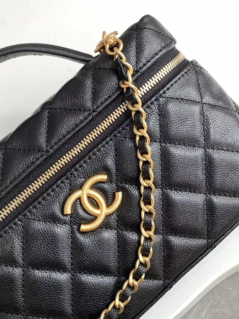 View 4 of Quilted Black Bag with Gold Hardware - Chic Compact Style