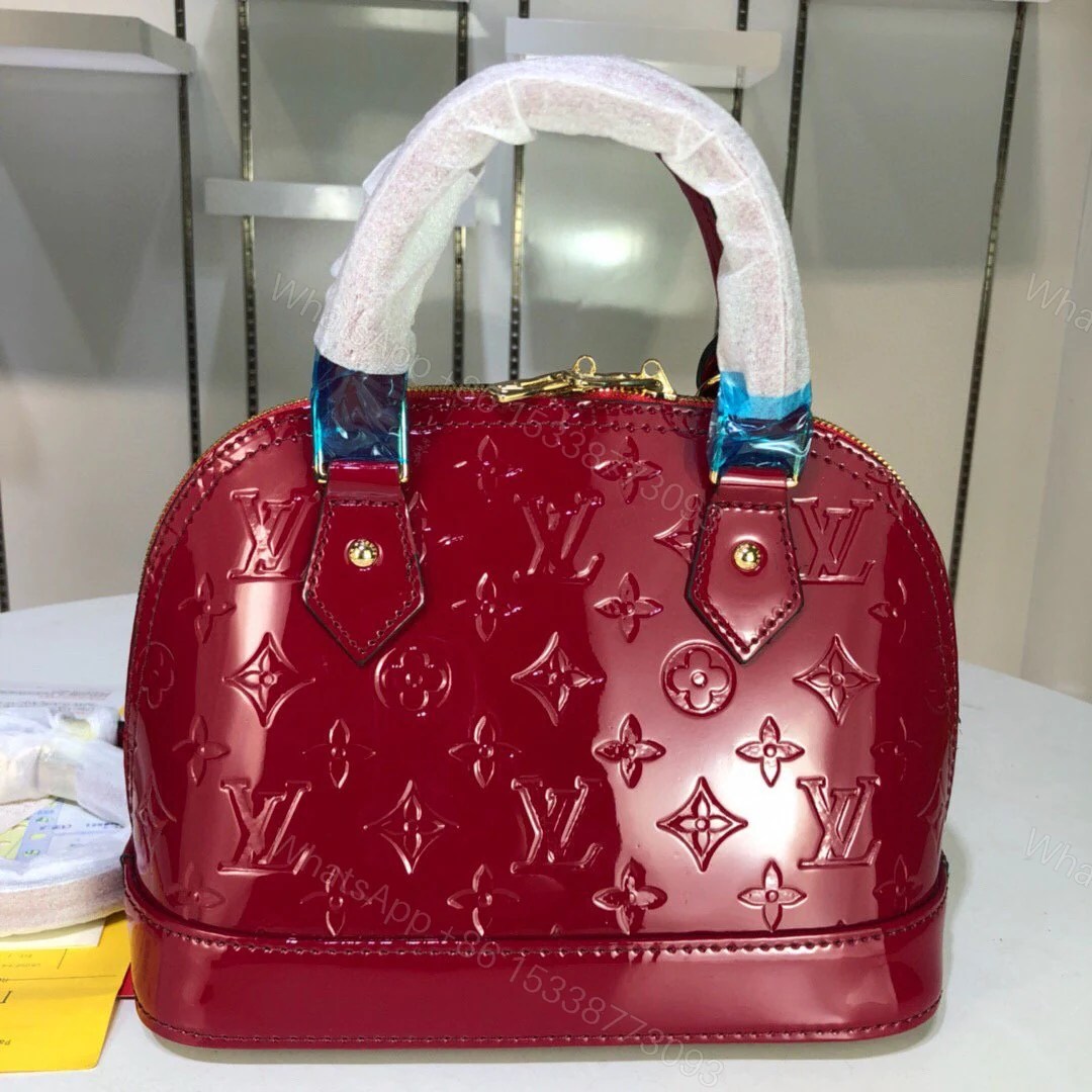 View 9 of Louis Vuitton Alma