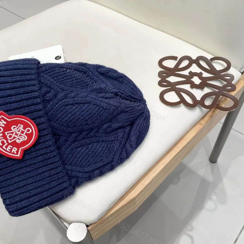 View 4 of Cozy Navy Knit Beanie with Ribbon Patch