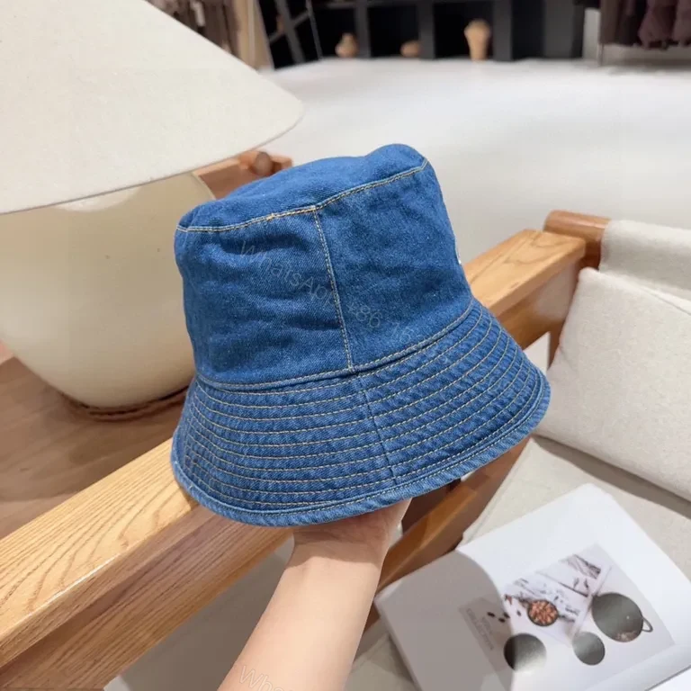View 6 of Denim CELINE Lettering Bucket Hat â€“ Casual Luxury Sunglow Style