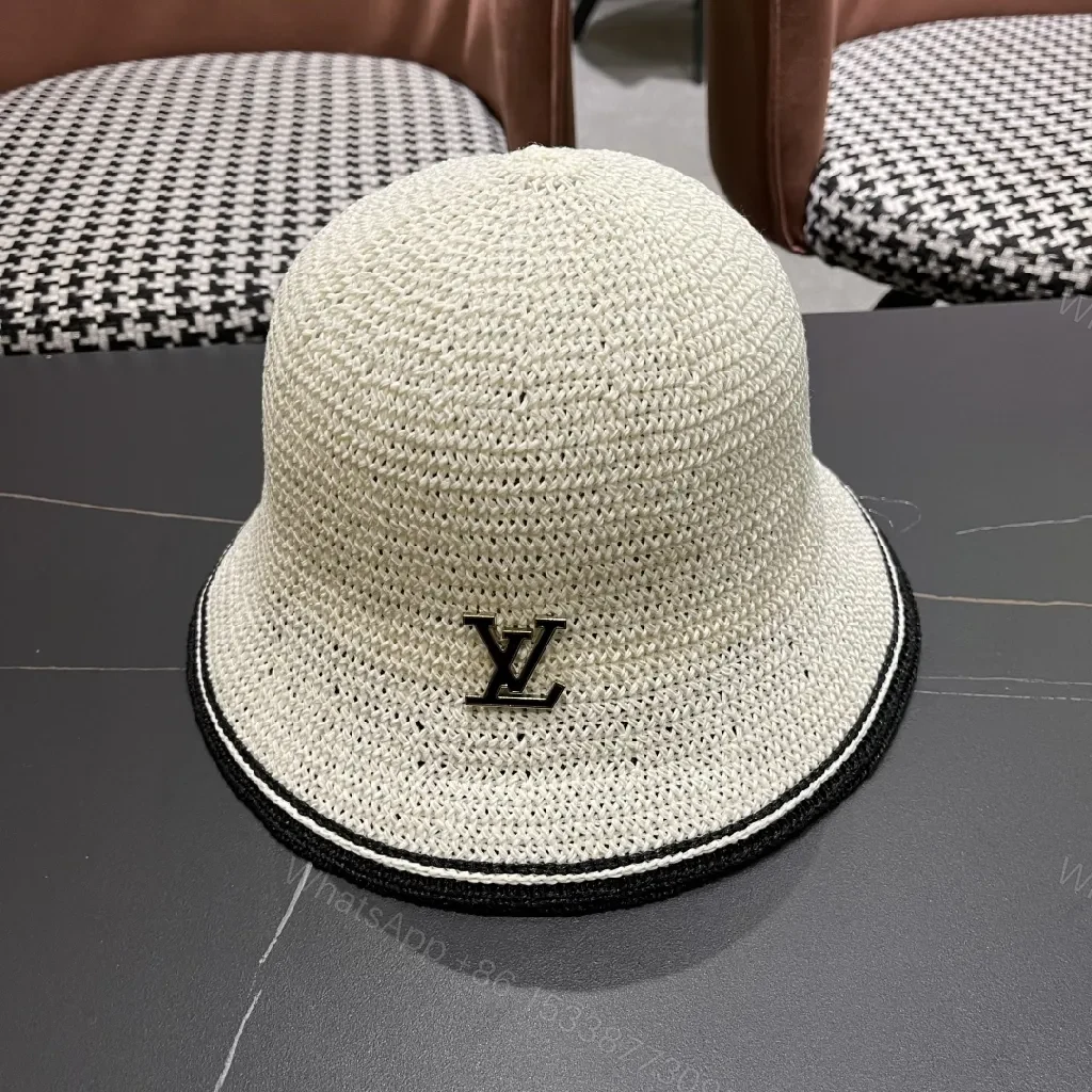 Chic Straw Bucket Hat with Subtle Luxury Accent — view 1