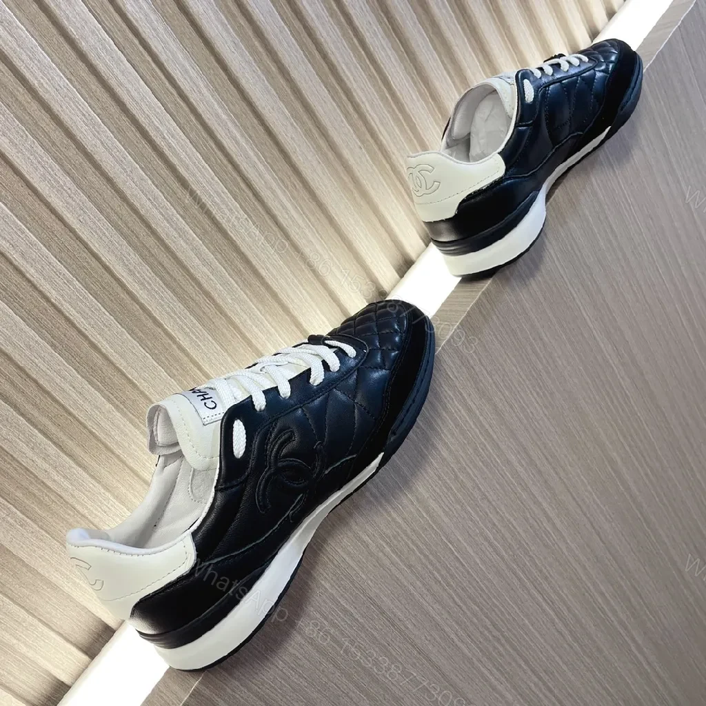 View 5 of Quilted Leather Sneaker - Dual-Texture Black & White, Luxe Comfort
