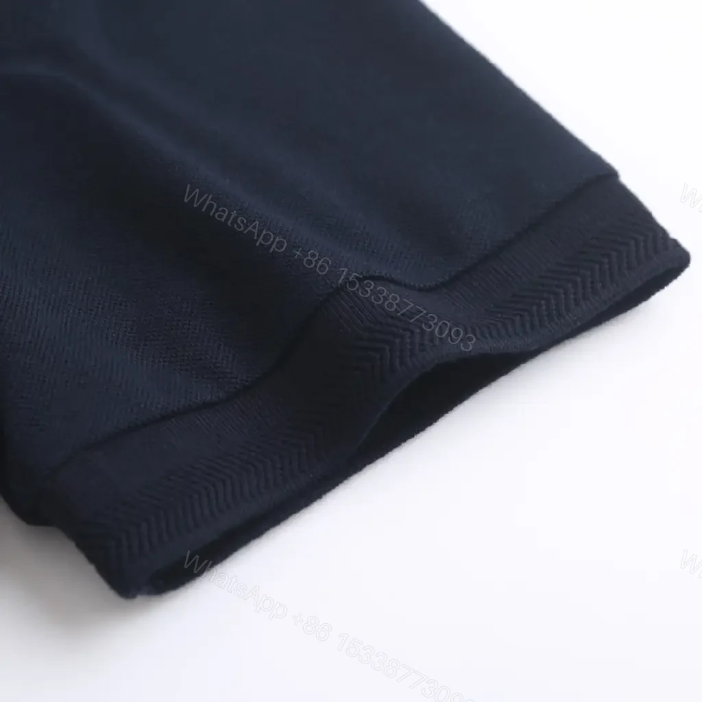 View 5 of Navy Pique Polo: Classic Knit, Luxe Texture, Everyday Style