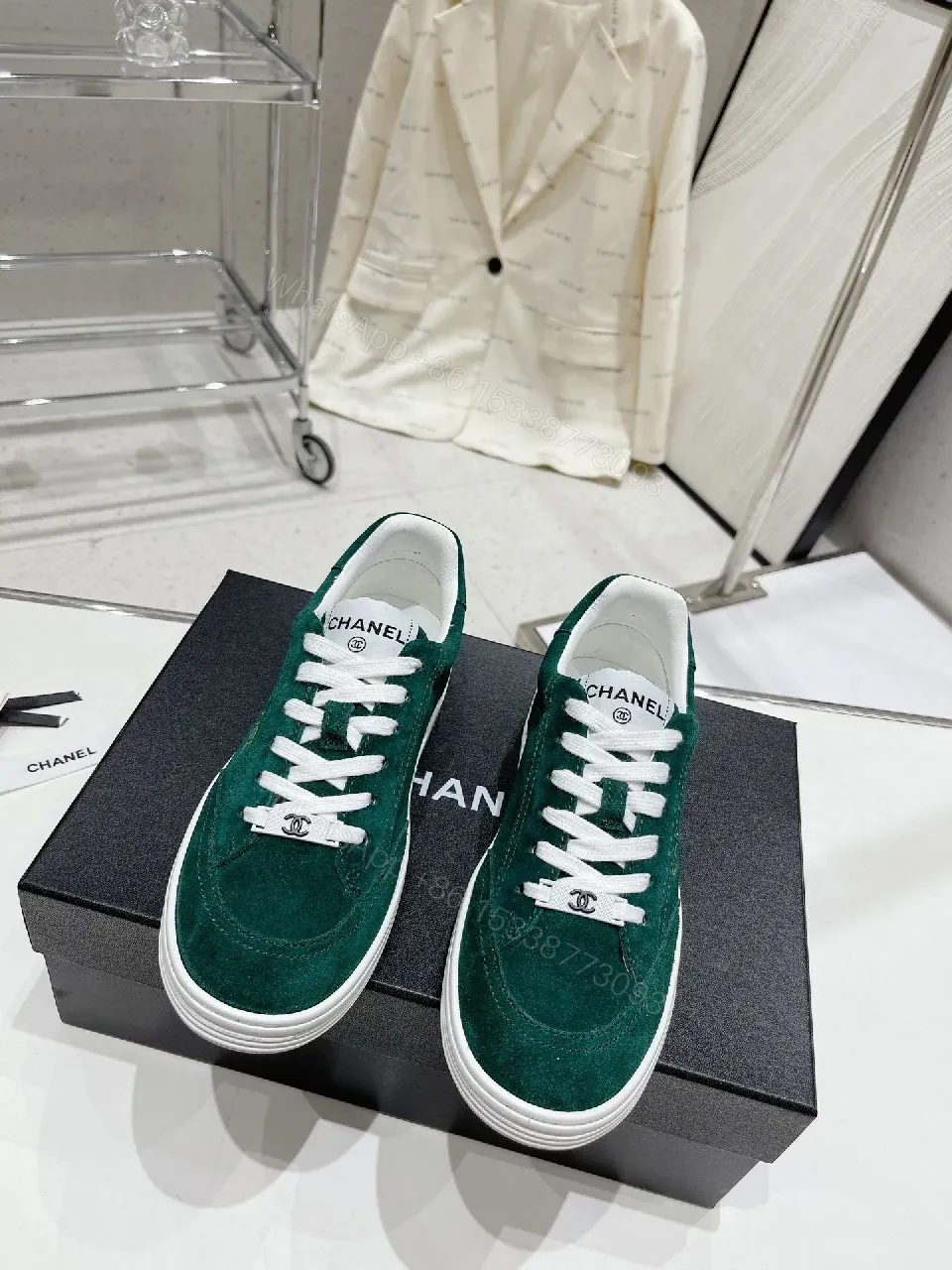 View 8 of Green Suede Sneakers with Signature Detailing, Luxe Casual Wear