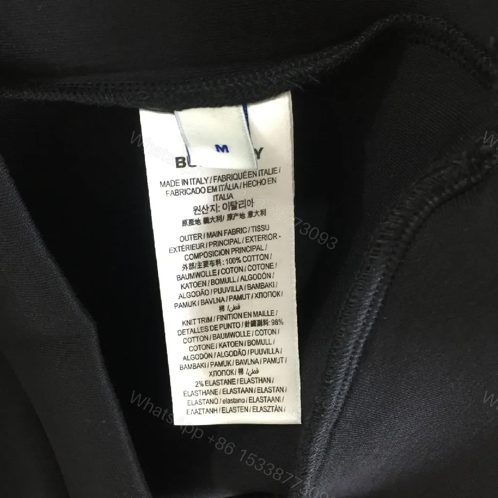 View 6 of Minimalist Black Hoodie with Gold Logo – Premium Casual Wear