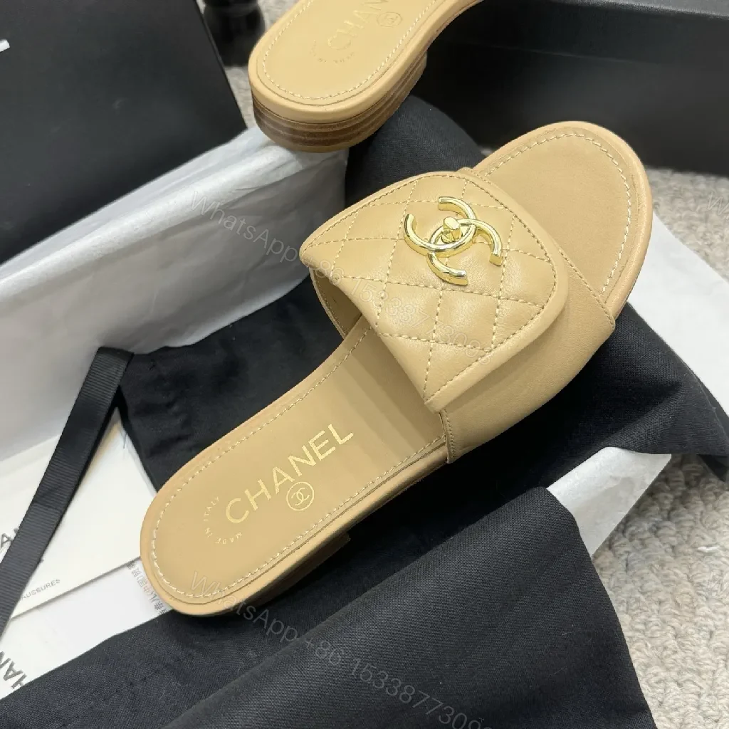 View 5 of Beige Quilted Leather Sliders with Gold Logo—Elegant Comfort
