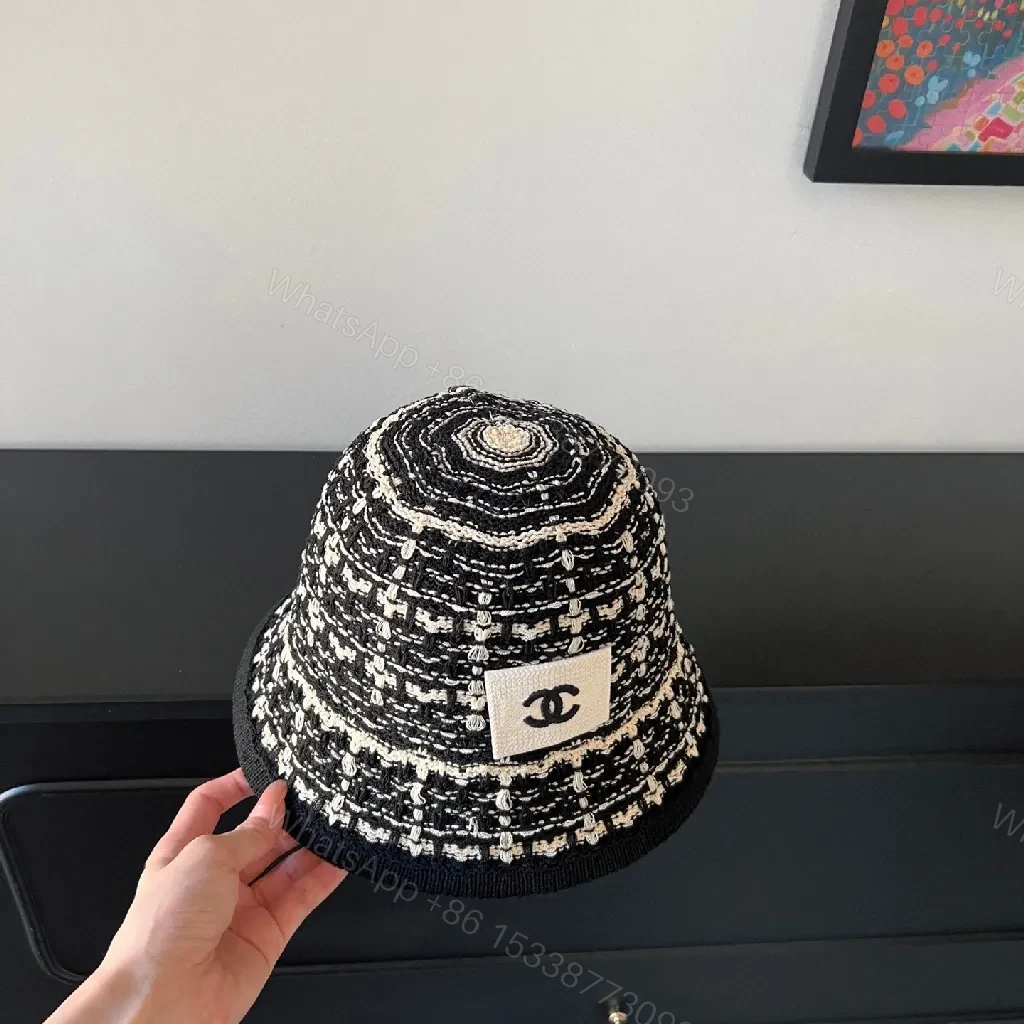 View 9 of Textured Black Bucket Hat | Tweed-Style Knit, Logo Patch, Classic