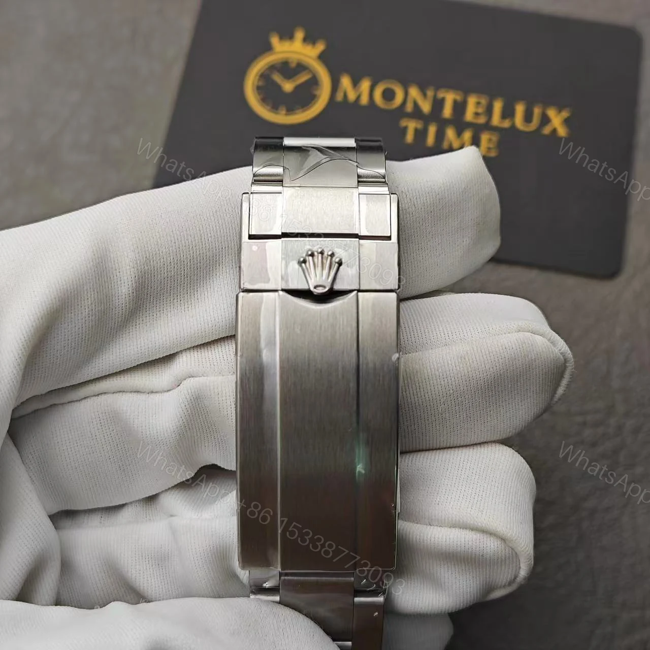 View 12 of Replica Rolex Submariner – Silver/Black 40mm 116610LN