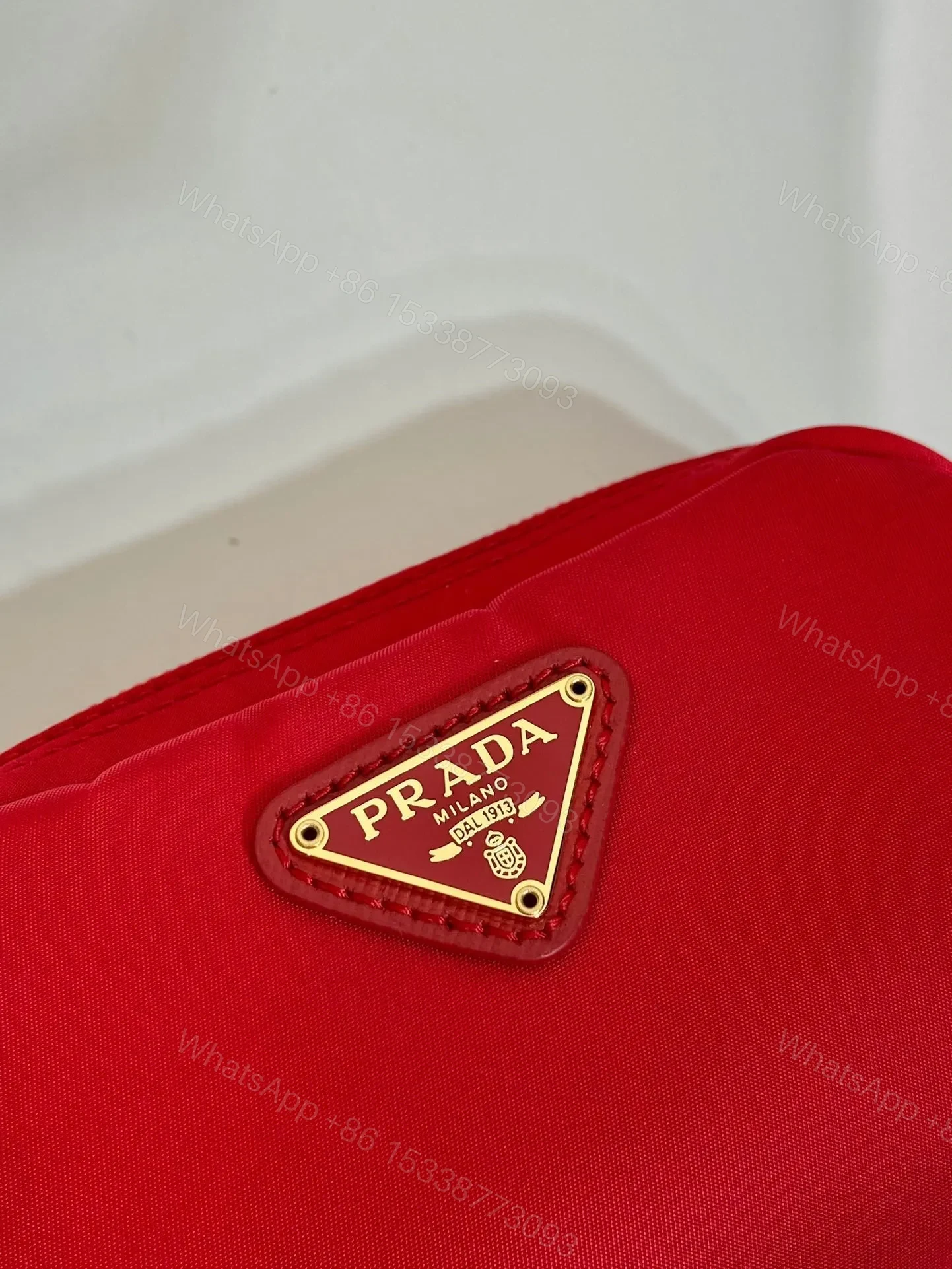 View 4 of CLUTCH 12 IN PASSION RED RE-NYLON