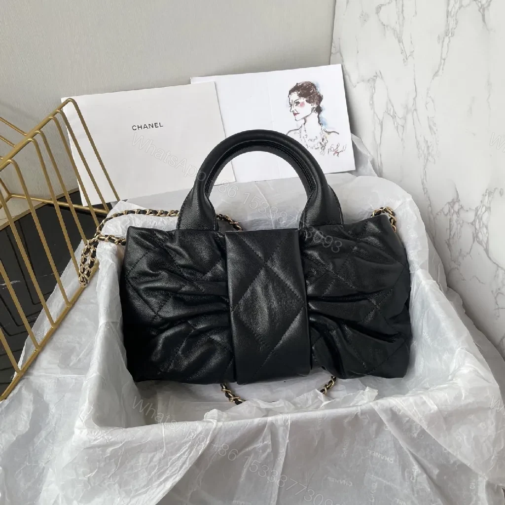 View 6 of Quilted Black Leather Handbag with Gold Hardware - Chic Style