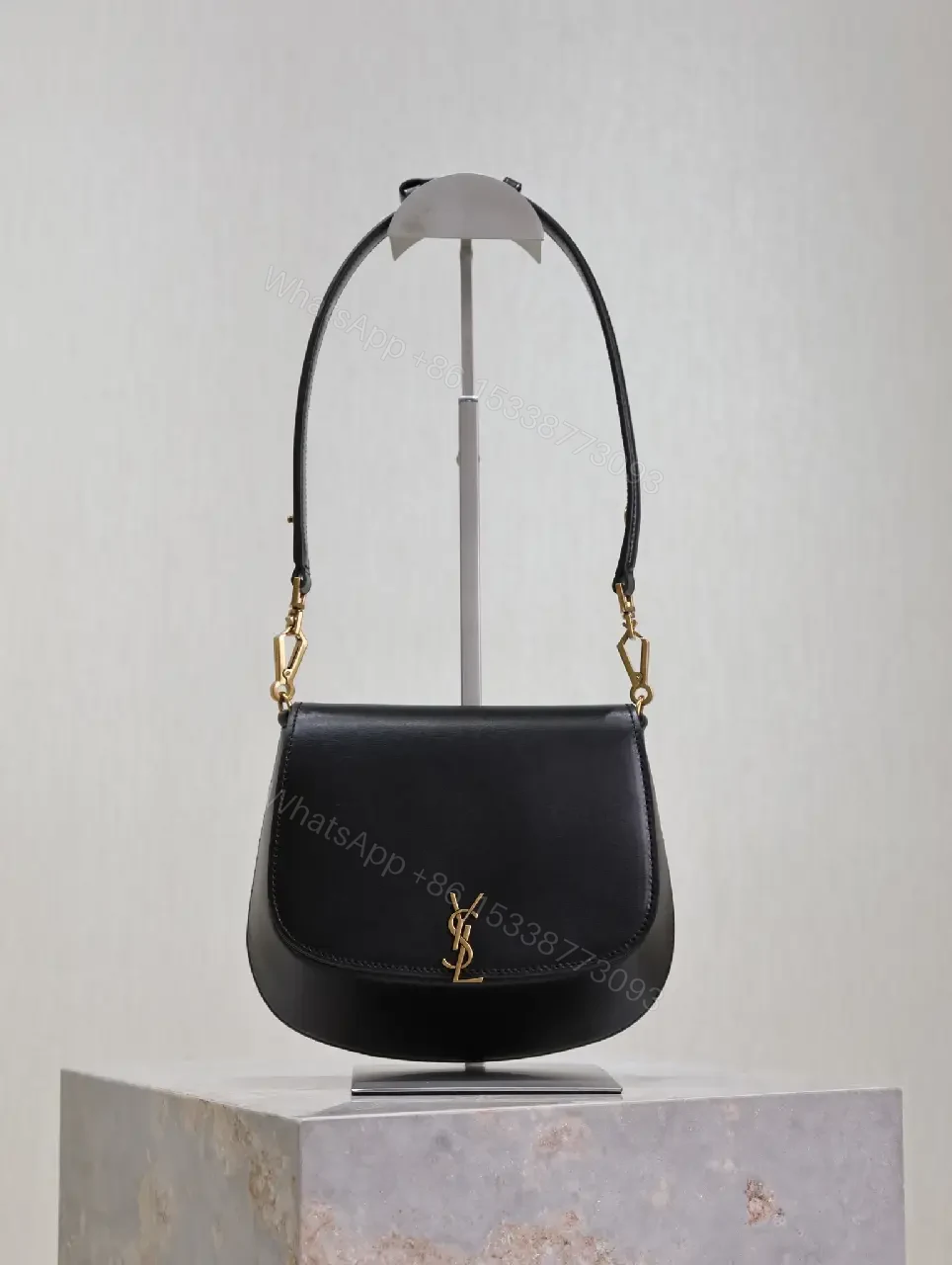 View 4 of Structured Leather Crossbody with Gold Emblem, Compact & Versatile Bag
