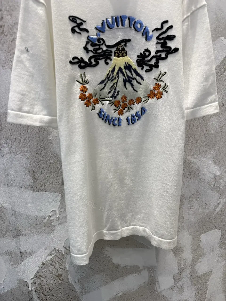 View 8 of White Embroidered Graphic Tee with Luxe Motif - Casual Luxury Top