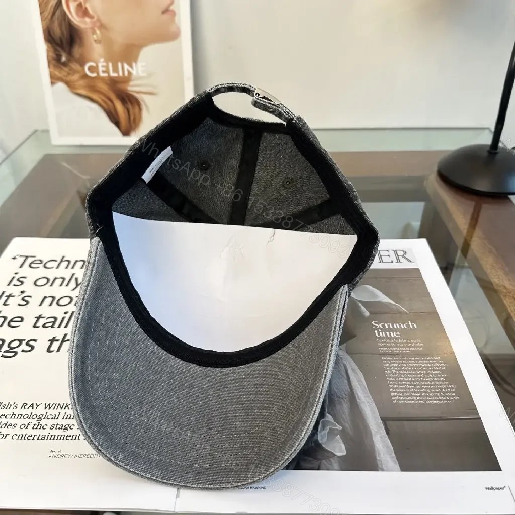 View 9 of Washed Dark Gray Denim Cap, Curved Brim, Distressed Texture, Prada Patch