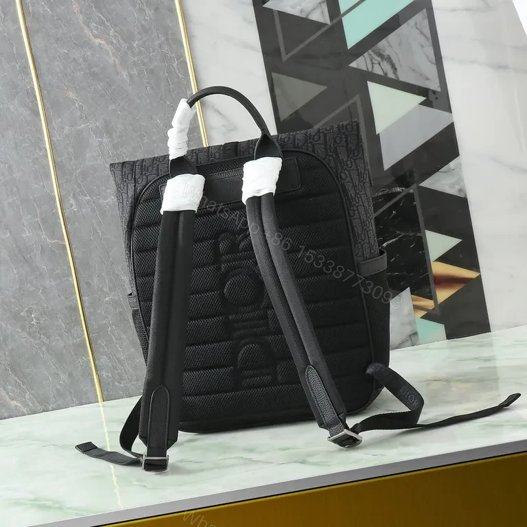 View 9 of Structured Pattern Backpack with Secure Flap Closure