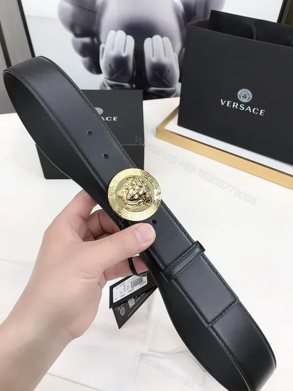 View 5 of Bold Medusa Buckle Belt: Luxury Black Leather Accessory
