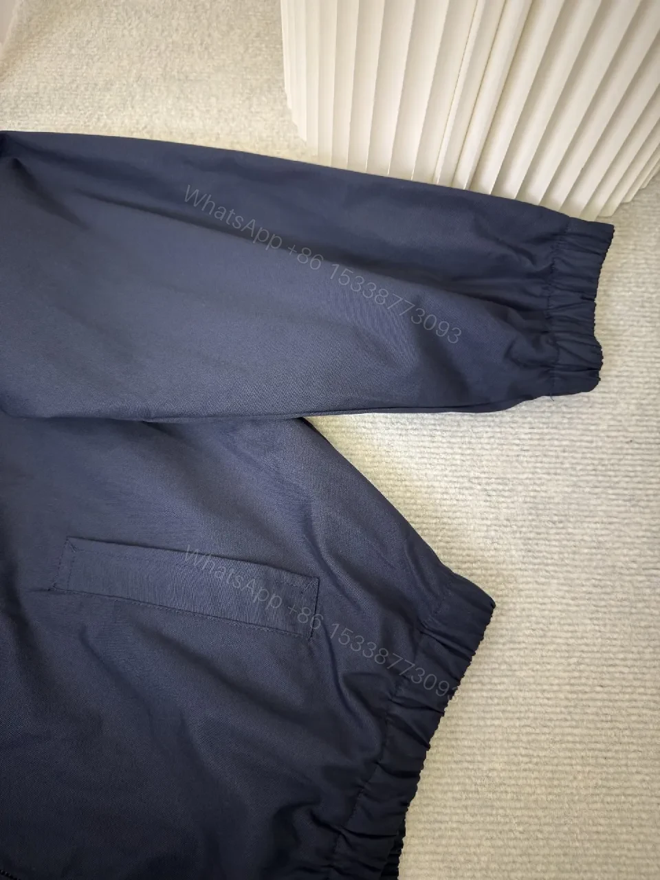 View 8 of Navy Windbreaker: Minimalist Luxe Light Shell, Subtle Logo