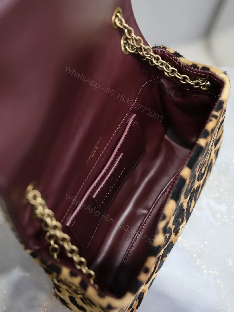 View 8 of Leopard Print Mini Bag with Gold Accent: Compact Luxury Bag