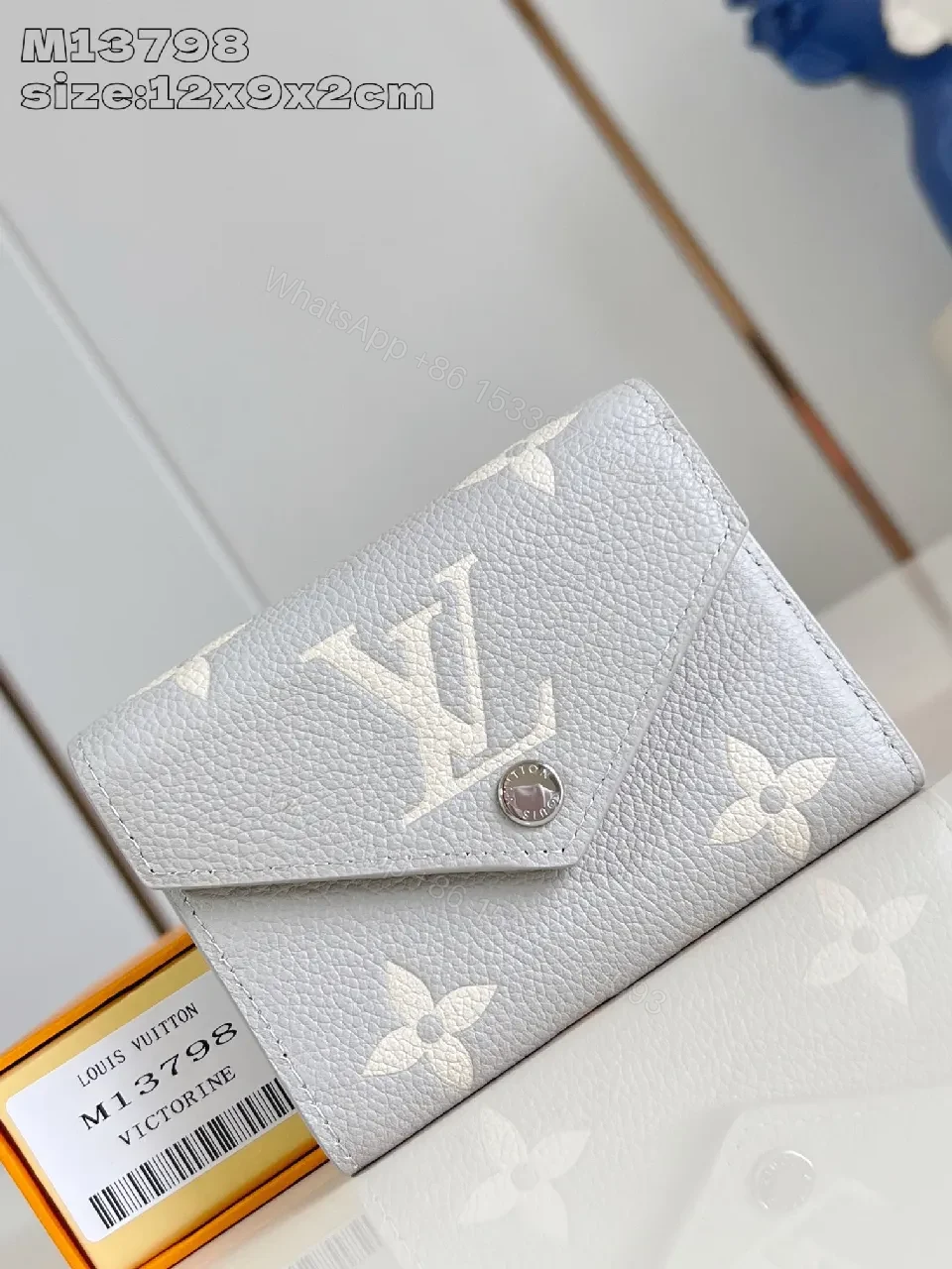 Gray Leather Compact Monogram Wallet with Signature Motif — view 1