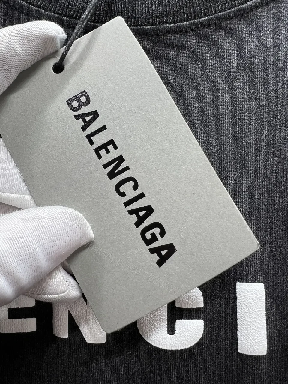View 9 of Vintage Black Logo Tee | Soft Cotton Blend, Oversized Fit, Distressed Seamless