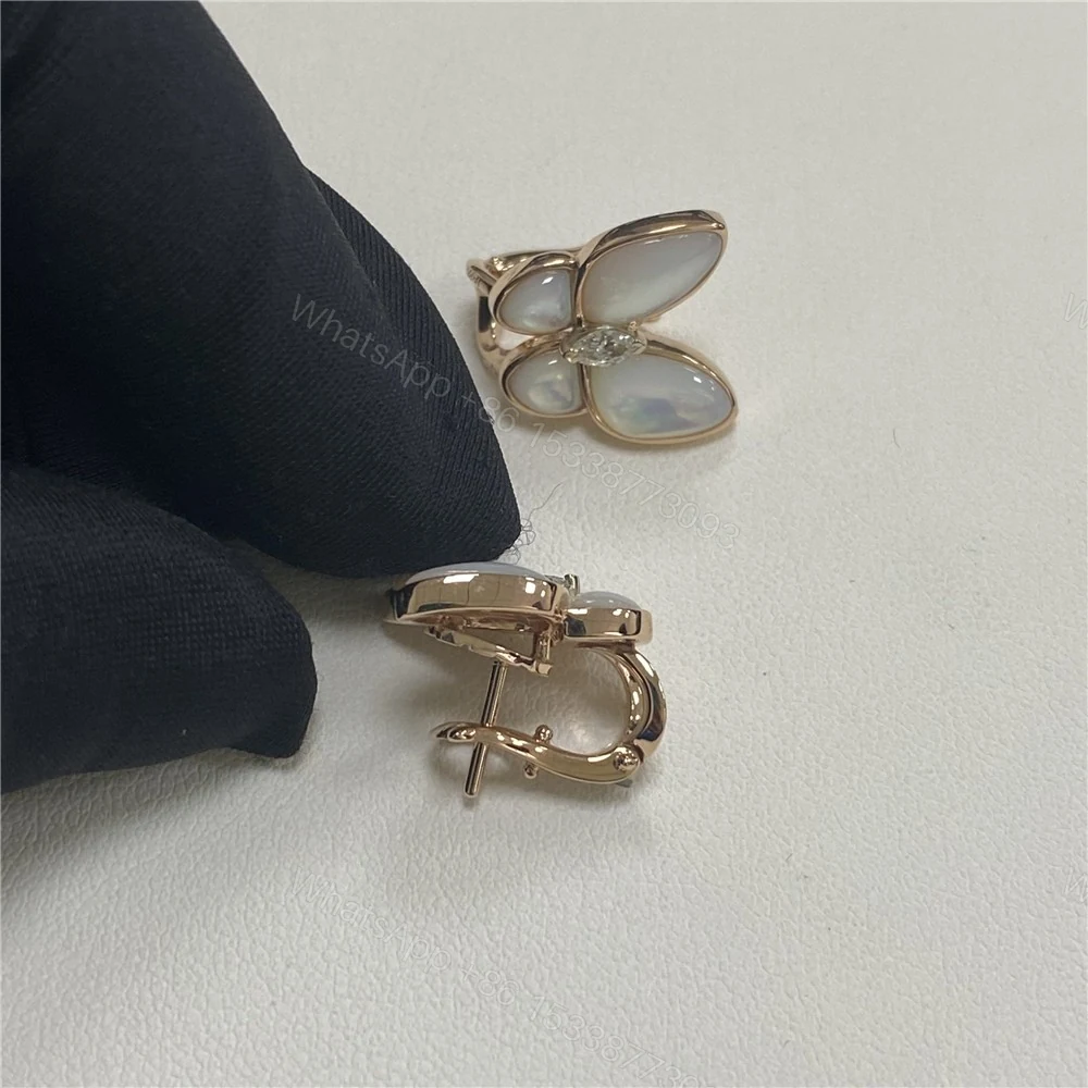 View 6 of Van Cleef & Arpels Two Butterfly Mother Of Pearl And Diamond Earrings VCARO8FN00