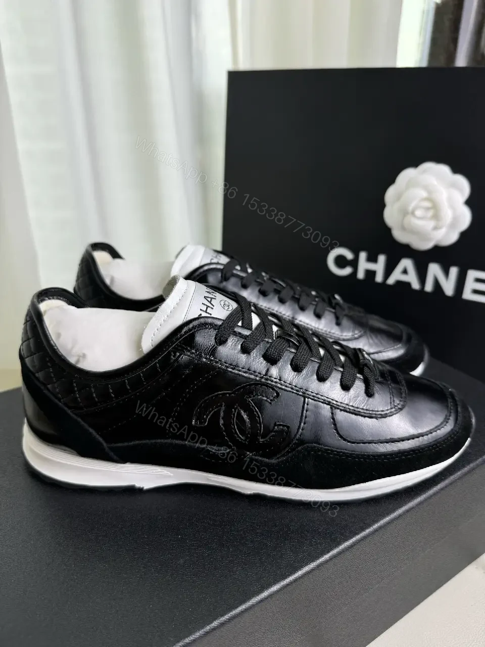 View 10 of Chic Black Leather Trainer — Luxury Comfort, Subtle Logo