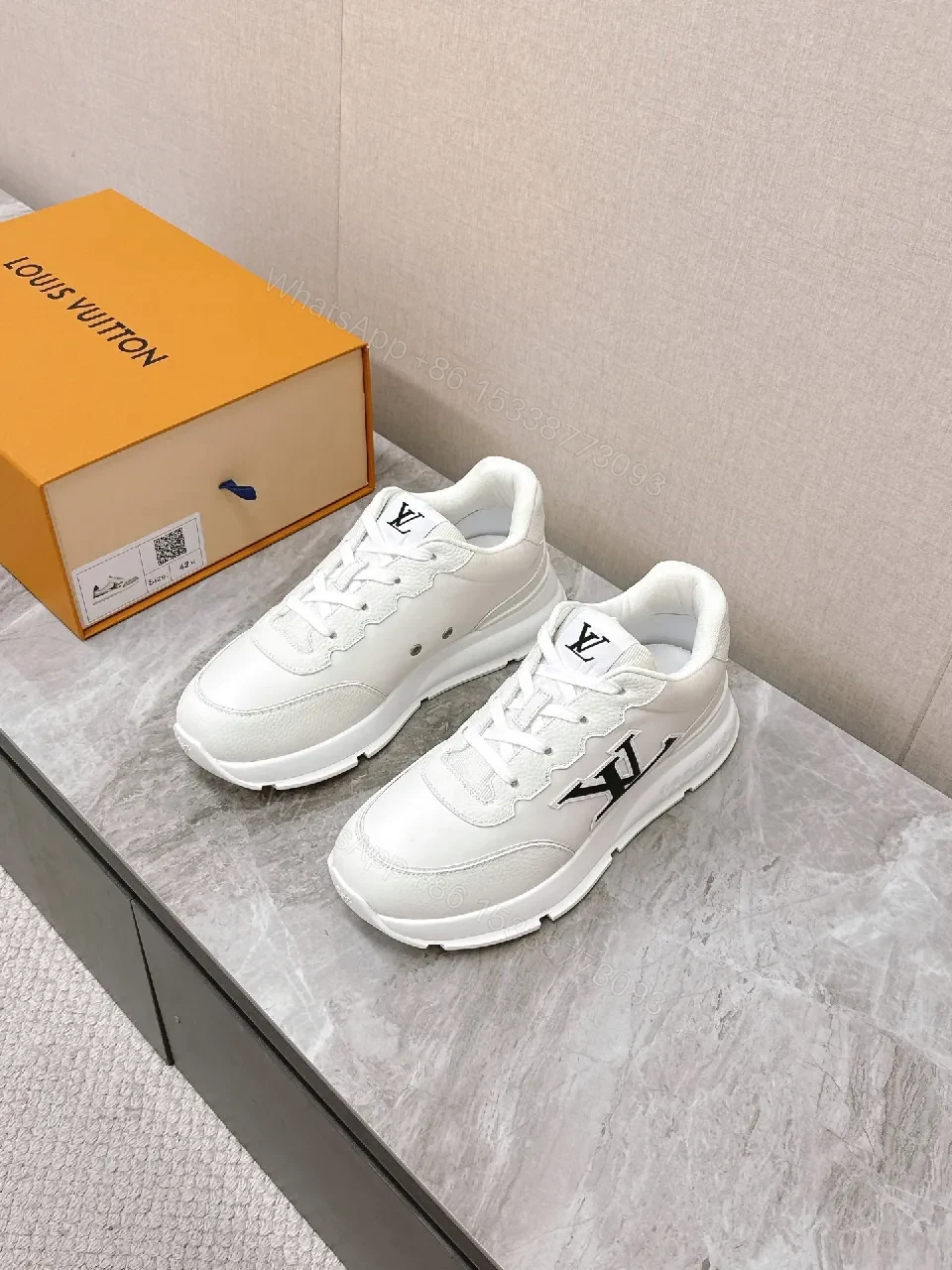 View 6 of White Leather Low-Profile Sneakers with Monogram Detailing