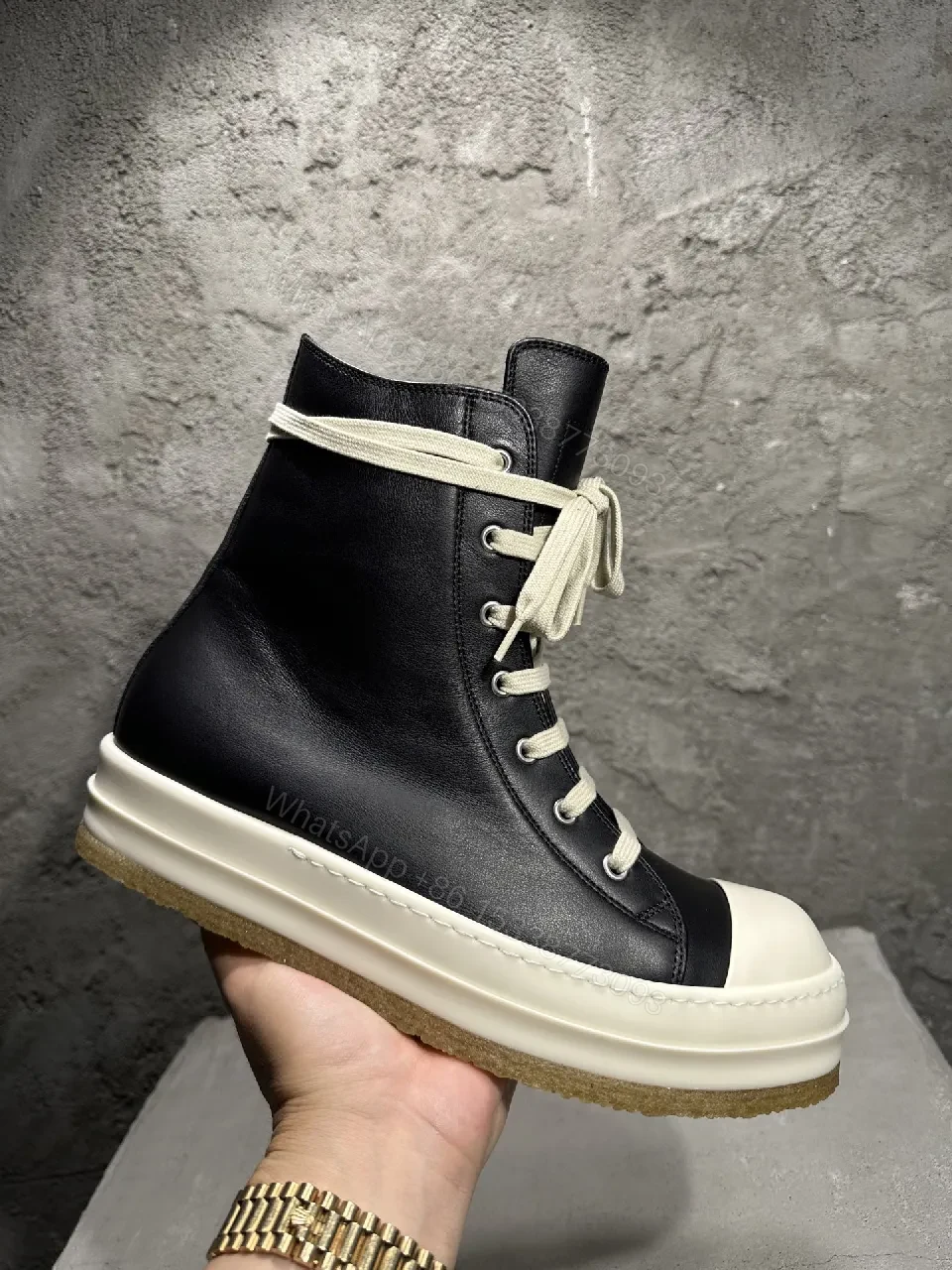 View 7 of Black Leather High-Top Sneakers with Off-White Accents