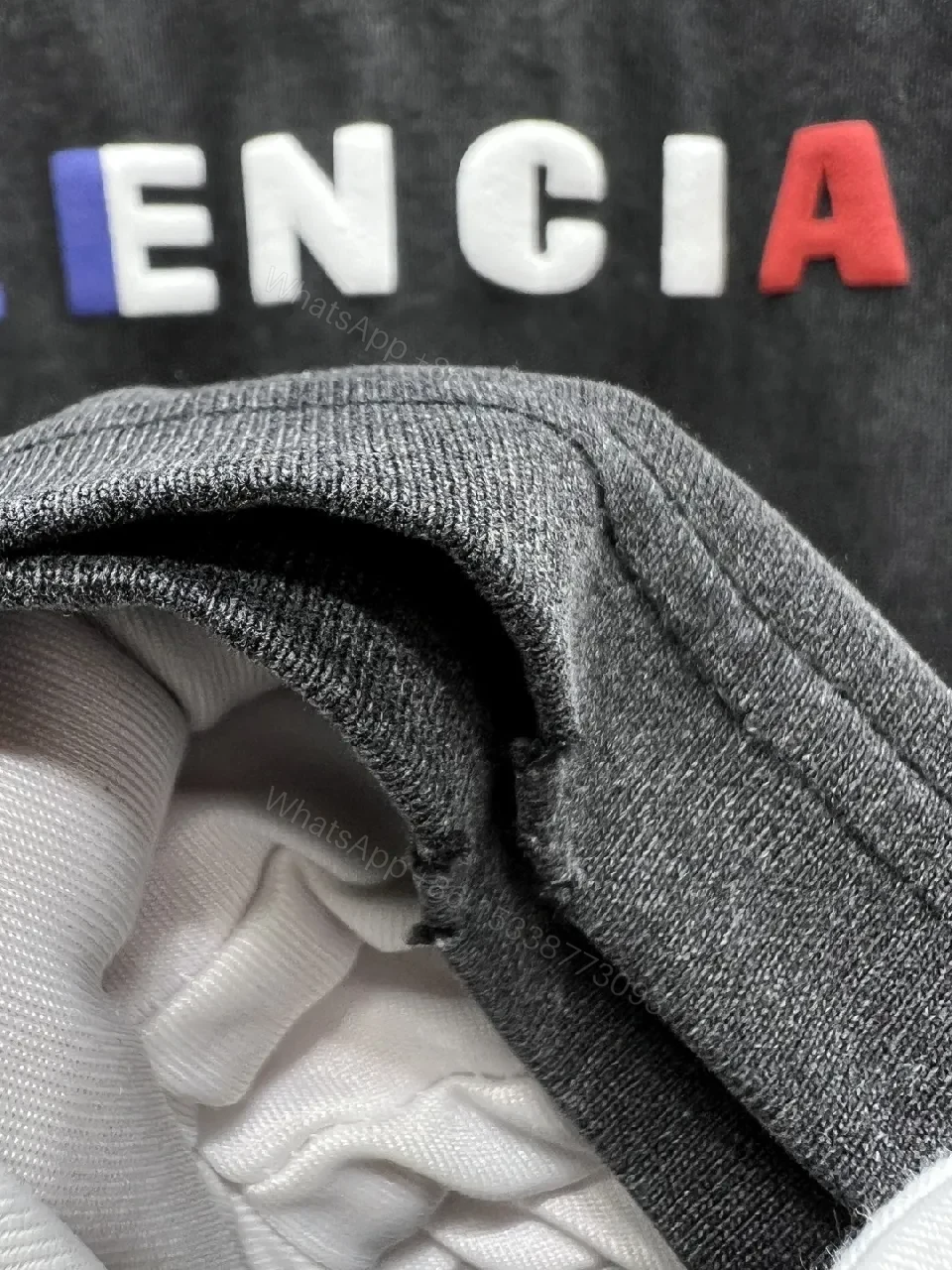 View 3 of Vintage Black Logo Tee | Soft Cotton Blend, Oversized Fit, Distressed Seamless