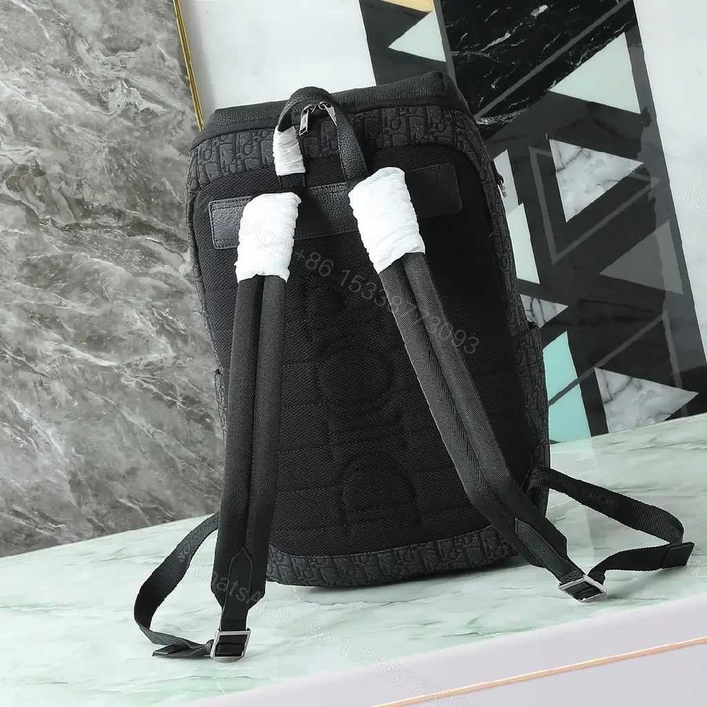 View 8 of Monogram Texture Compact Luxury Backpack - Day-to-Night Utility