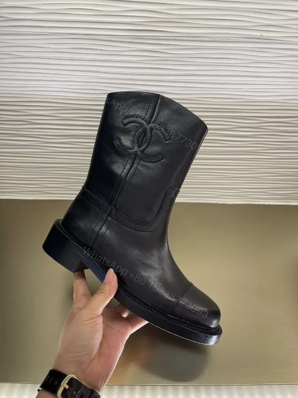 View 3 of Chic Black Leather Knee-High Boots with Logo Embellishment