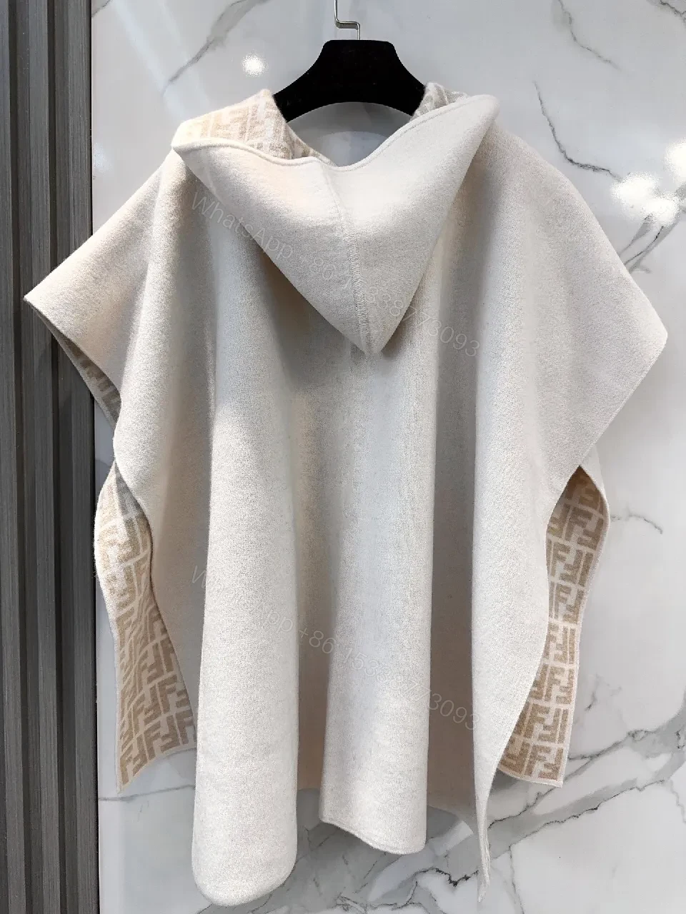 View 4 of Soft-Neutral Knit Cape Jacket: Luxury Comfort & Signature Trim