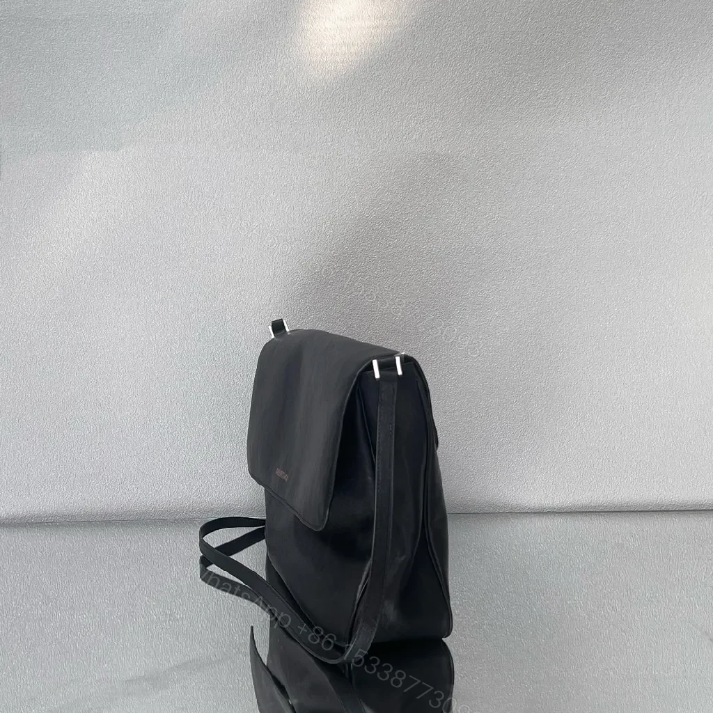 View 7 of Minimalist Black Leather Crossbody: Compact Luxury Bag