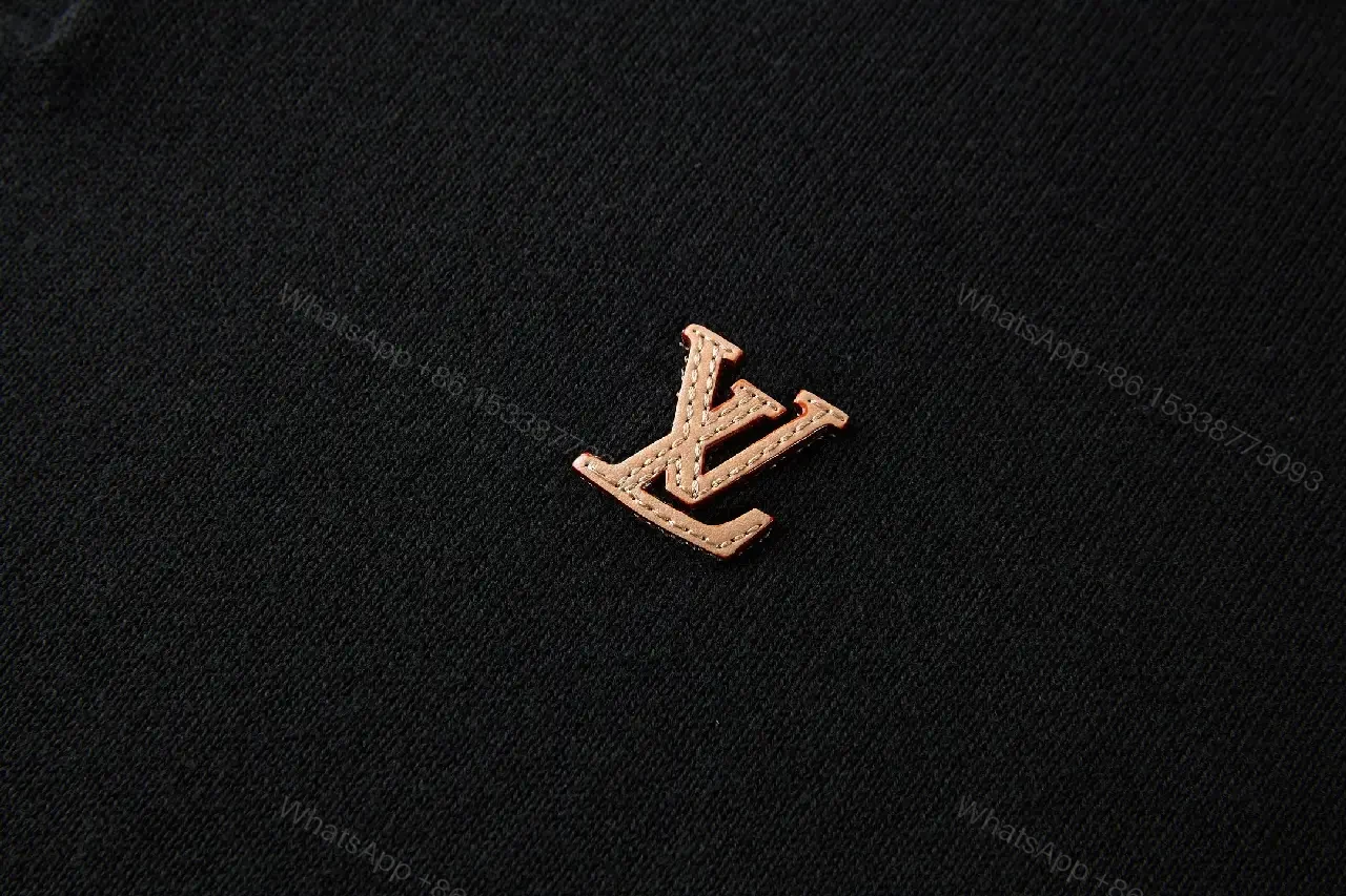 View 5 of Polished Polo Tee: Black Knit with Gold Crest Polo Shirt