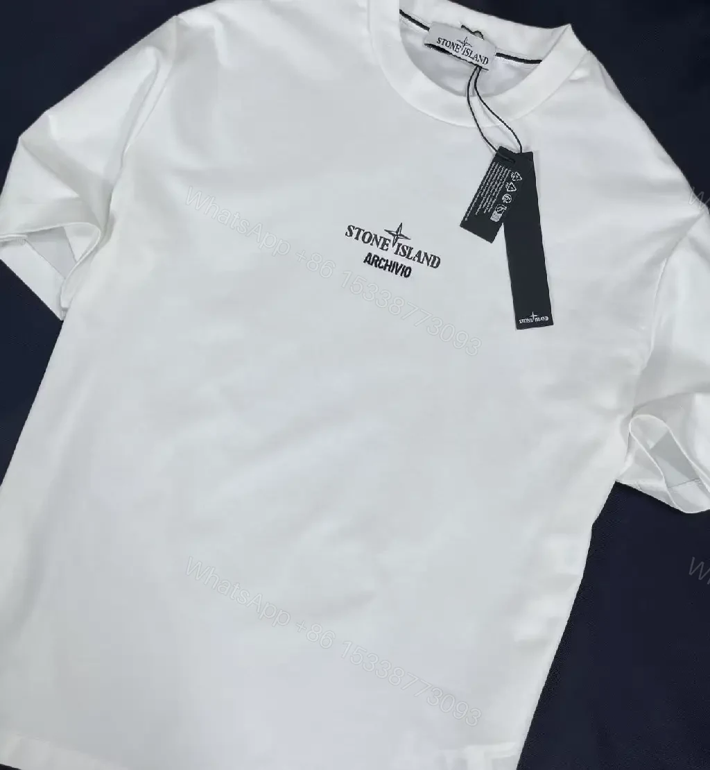 View 9 of Minimalist White Tee with Subtle Logo – Premium Everyday Comfort