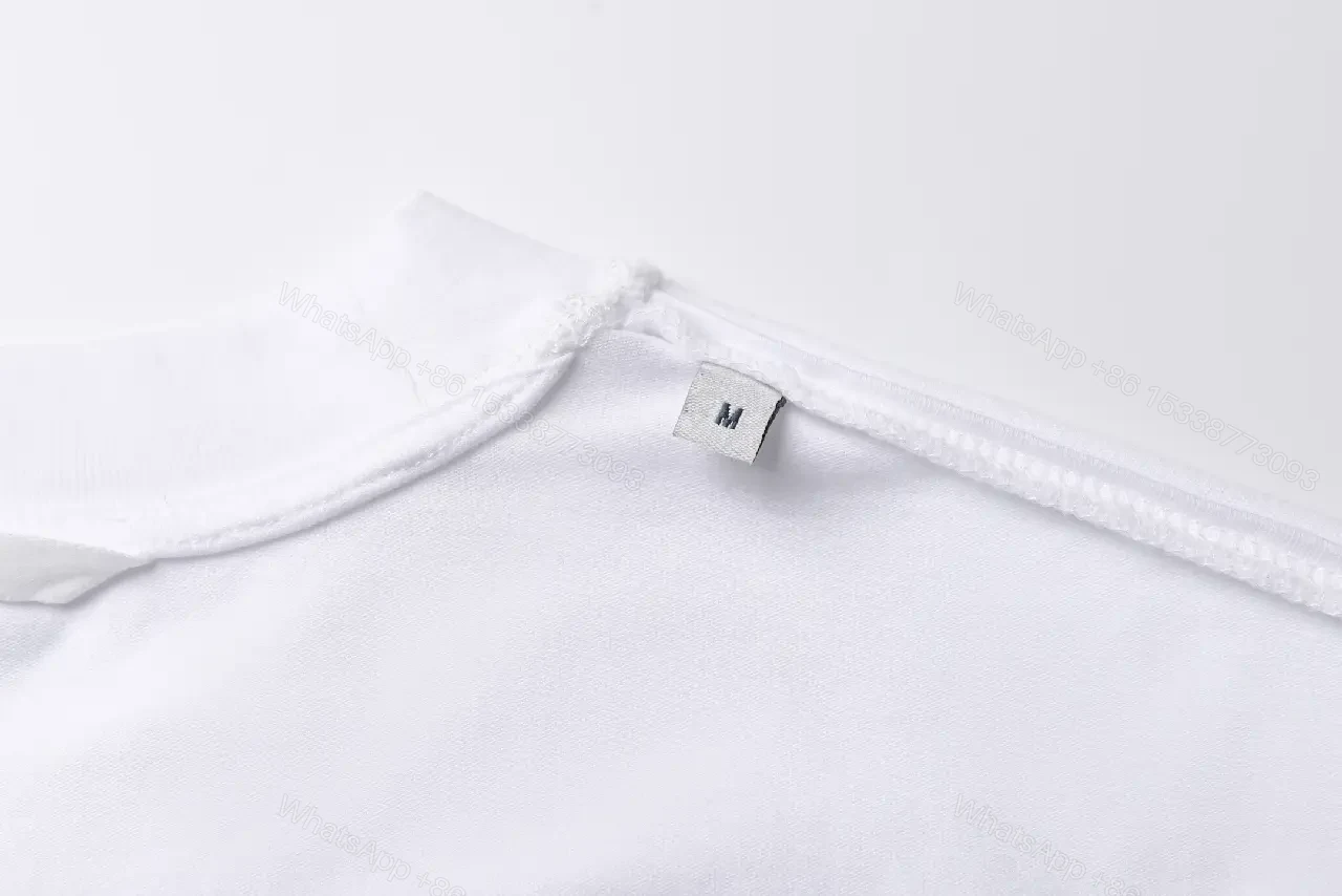 View 4 of White Cotton Moncler Tee: Subtle Luxury Everyday Comfort