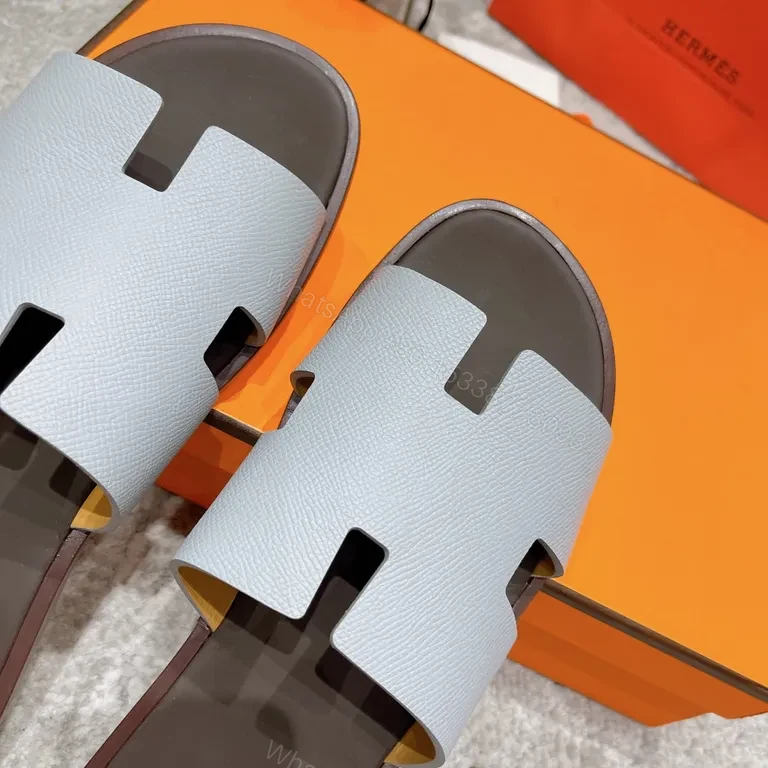 View 3 of Ice-Blue Hermes Oran Slides: Clean, Confident Comfort