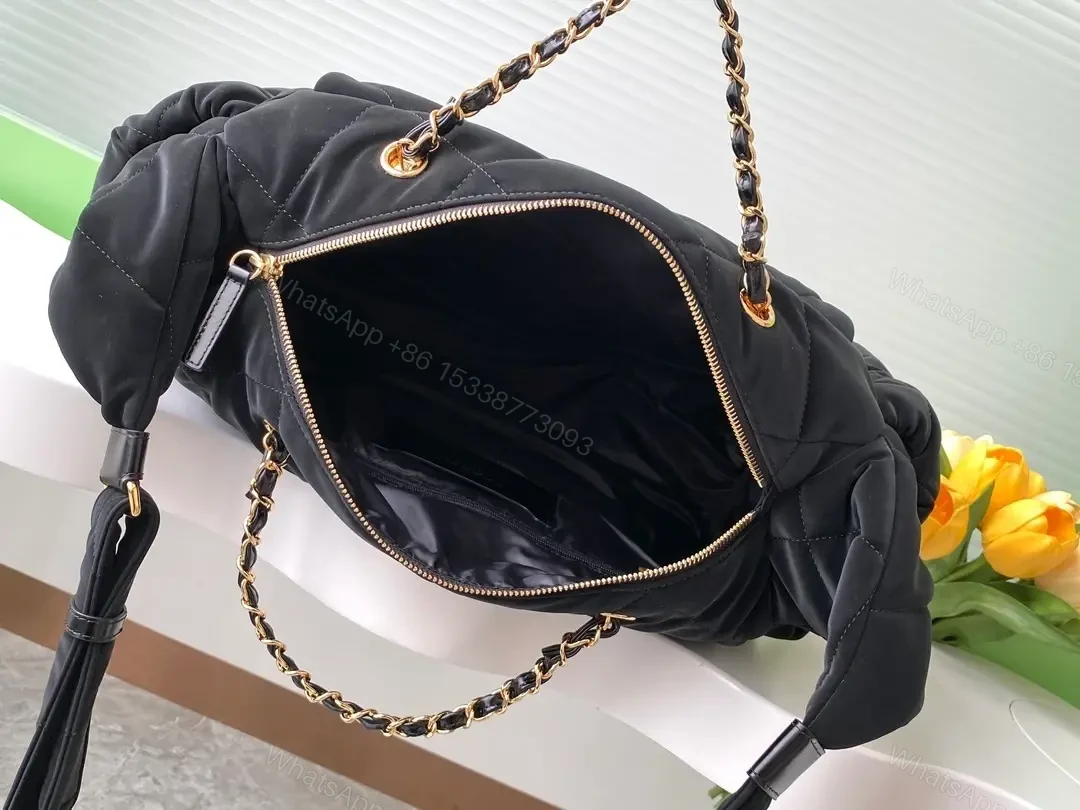 View 8 of Quilted Black Bag with Gold Chain - Compact Chic Signature