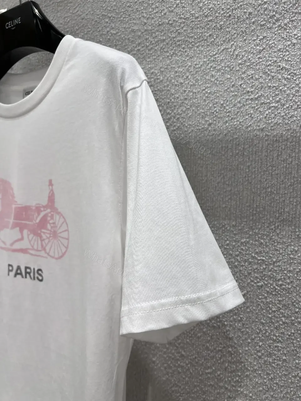 View 10 of Minimalist White Tee — Premium Cotton, Subtle Logo, Modern Style