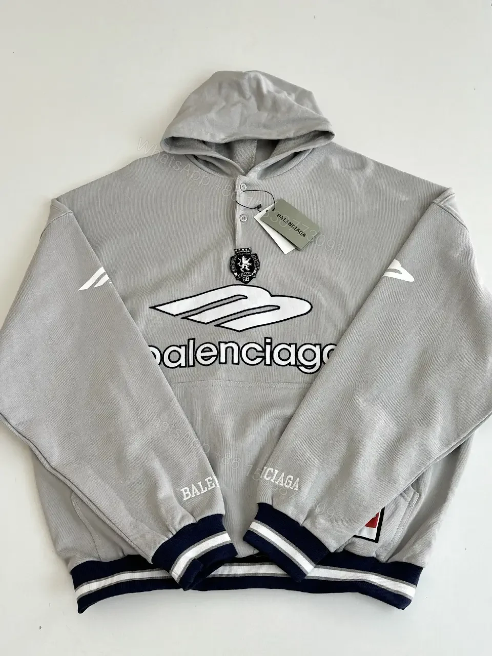View 10 of Soft-Edge Comfort Hoodie: Graphic Branding, Oversized Streetwear