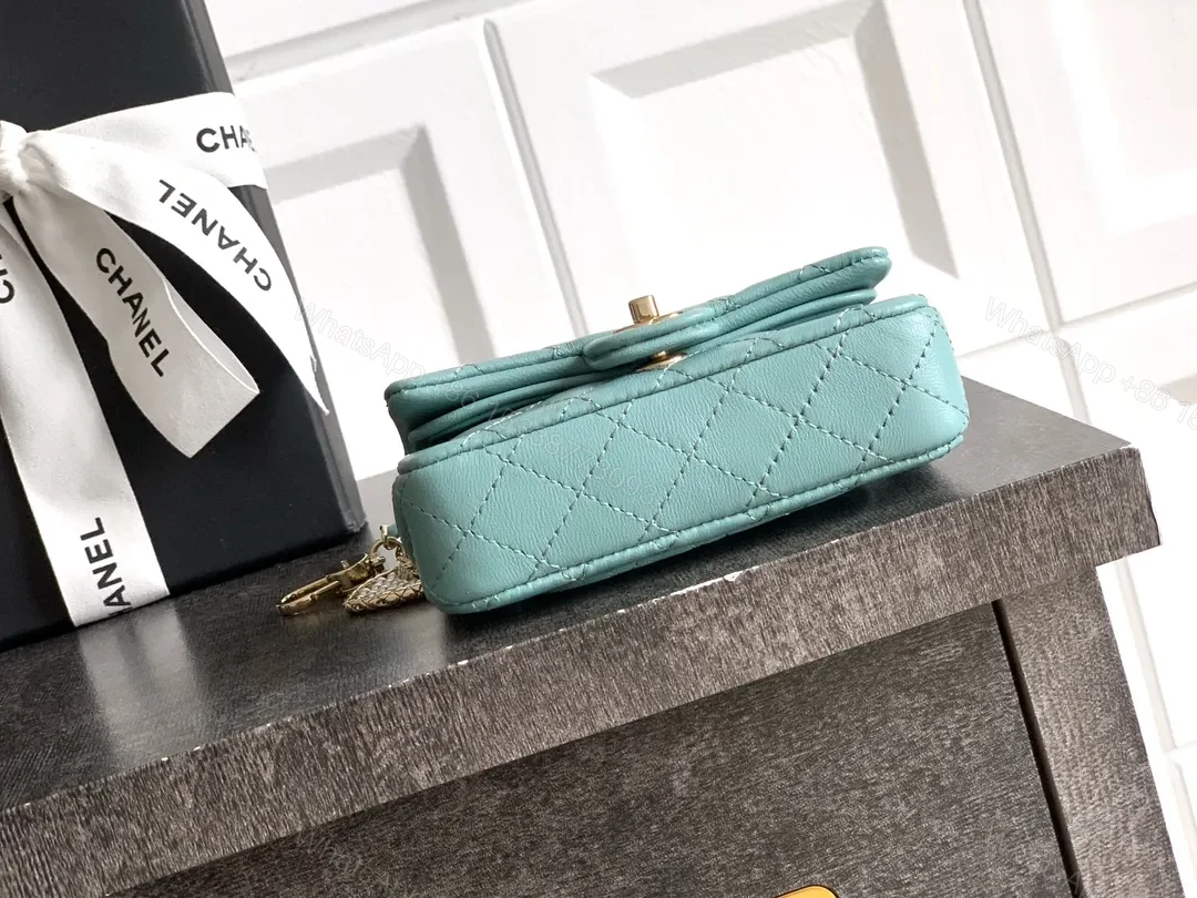 View 9 of Pastel Aqua Quilted Mini Bag with Pearl Charm (Chic)